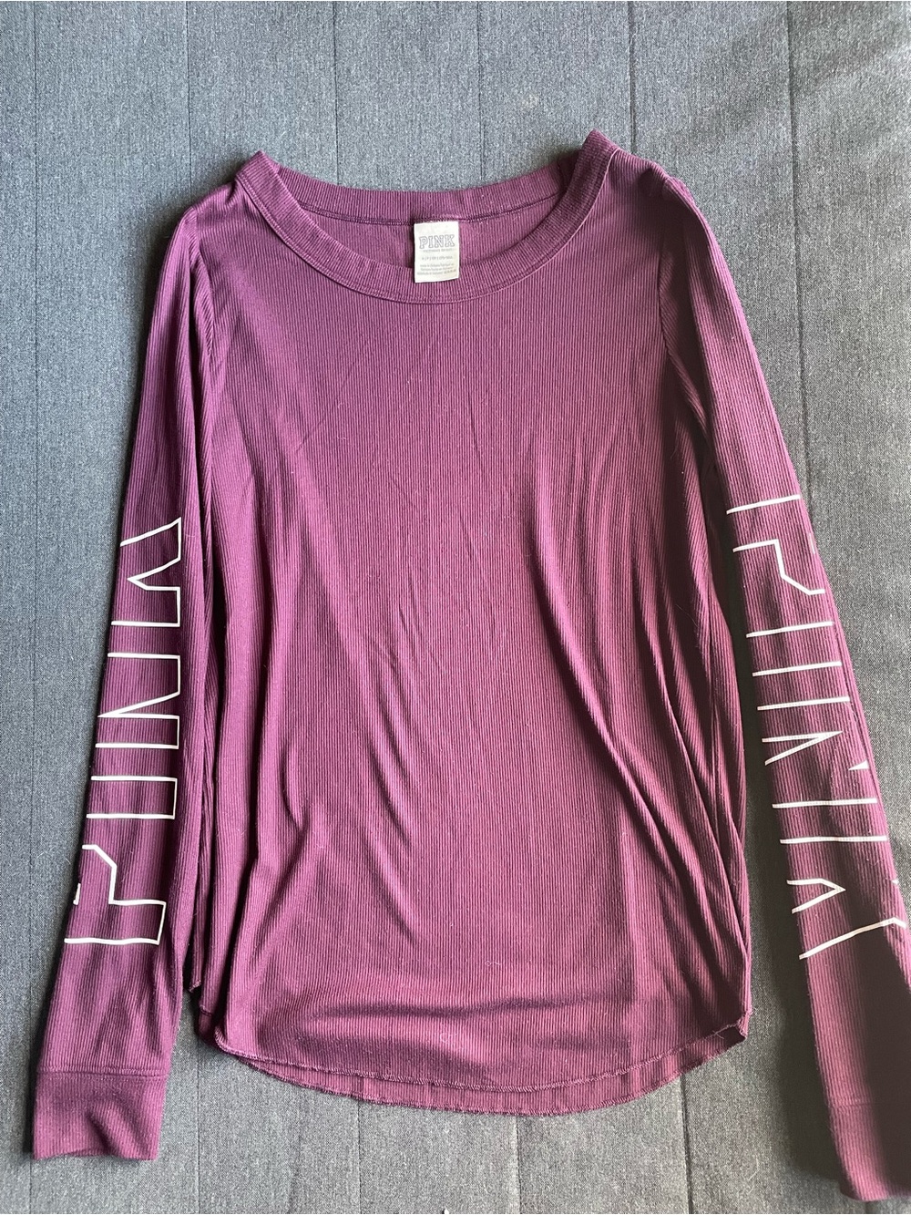 Pink long sleeve burgundy wide-neckline shirt with logo on sleeves, size small